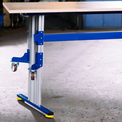 height adjustable working table, flexible on casters, and tilting 